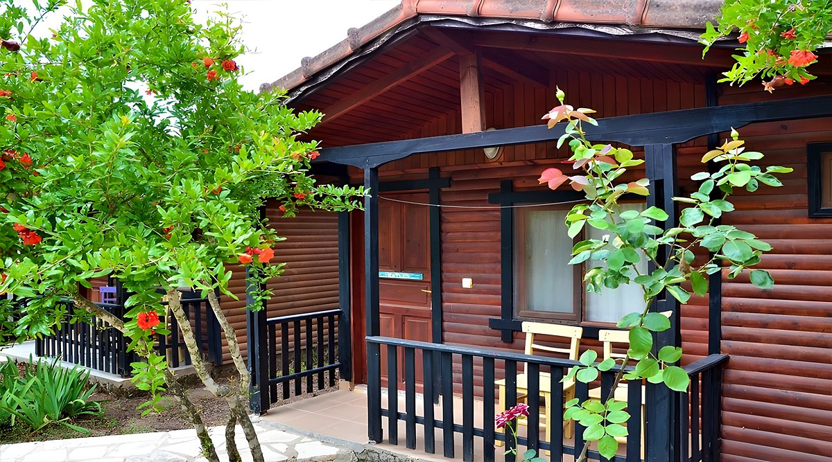 Bungalow Room: timber bungalow and balcony surrounded by flowers