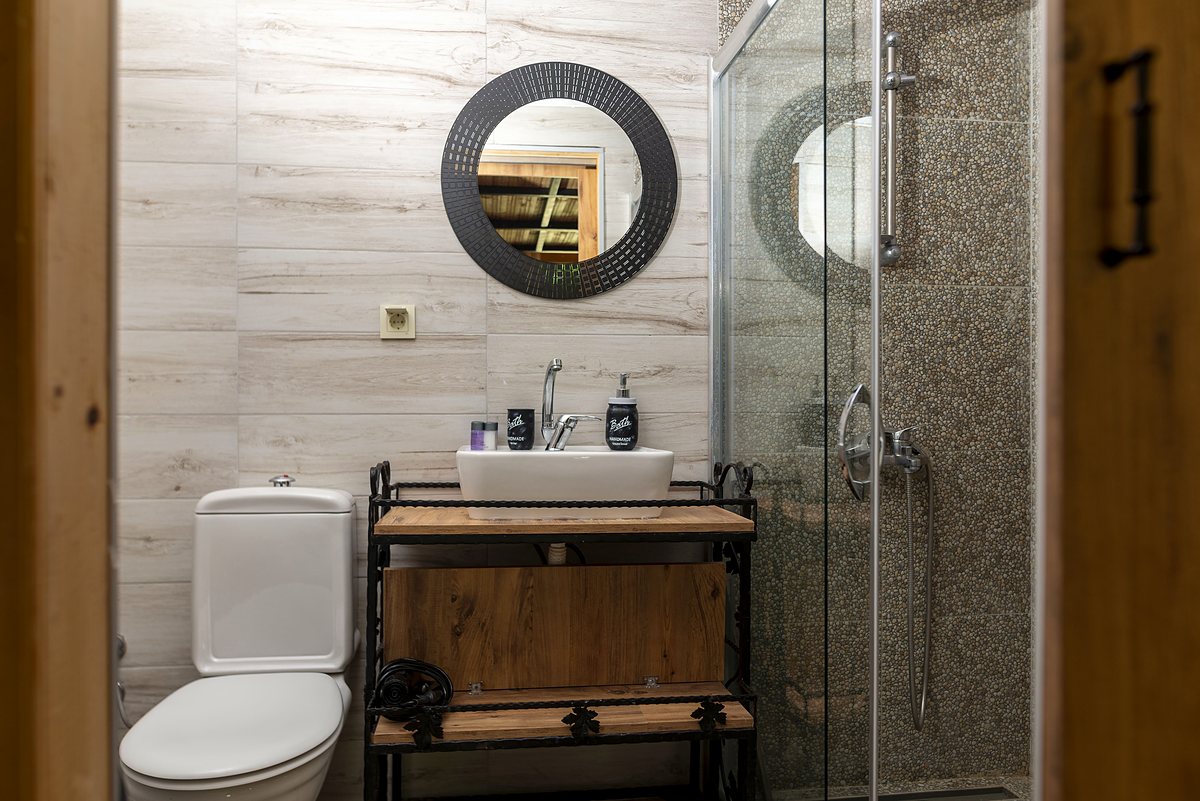 Duplex Bungalow bathroom: shower cabin, washbasin and toilet
