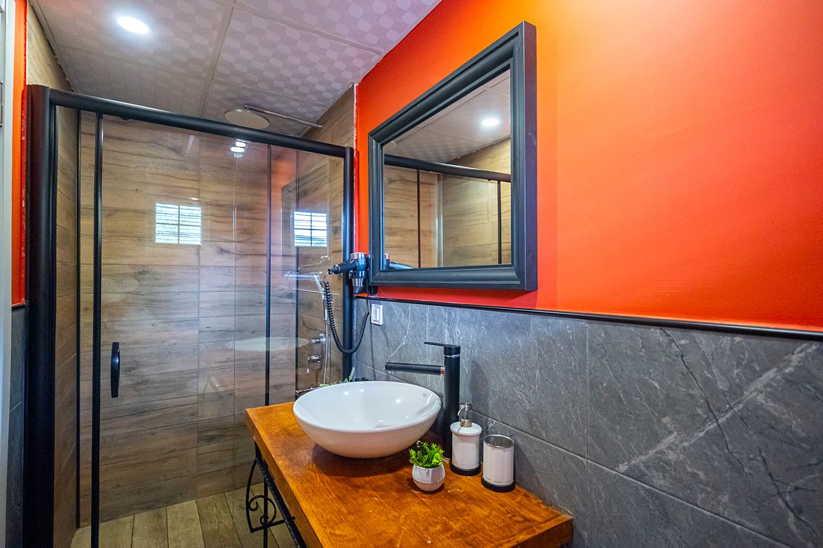 Terrace Bungalow bathroom: shower cabin and vessel sink