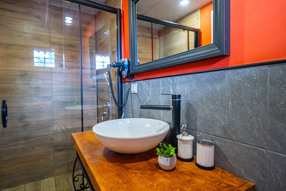 Terrace Bungalow bathroom: timber counter and vessel sink